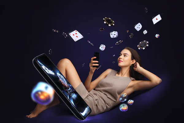 A professional dealer in a tuxedo greeting players at the roulette table, symbolizing the authentic live casino feel at 9777BED.