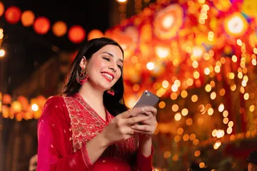 A stylish woman beside vibrant slot machines displaying glowing sevens, showcasing the variety of top slots at 9777BED.