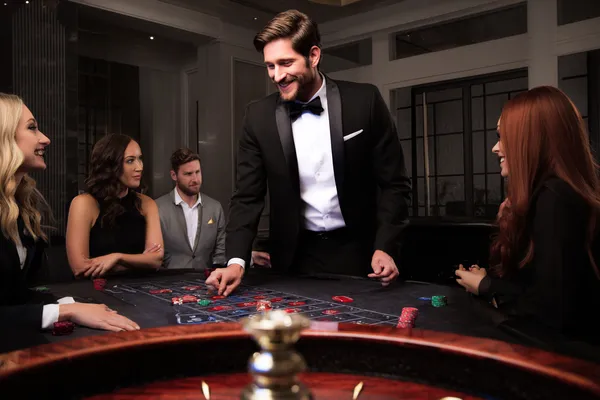 9777BED Member Login — Return to your personalized dashboard A person using their device against a moody casino-themed background, illustrating the smooth re-entry process at 9777BED.